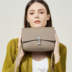 A new, fashionable, versatile saddle bag for women, a lightweight, luxurious genuine leather women's bag, a stylish, single-shoulder crossbody bag.