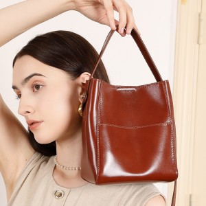 2025 new retro vegetable-tanned cowhide small bucket bag, niche genuine leather single-shoulder crossbody handbags