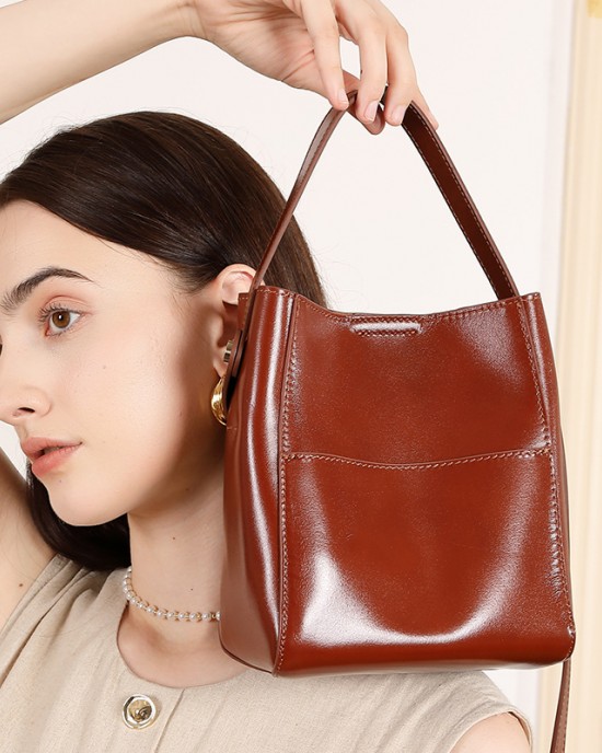 2025 new retro vegetable-tanned cowhide small bucket bag, niche genuine leather single-shoulder crossbody handbags