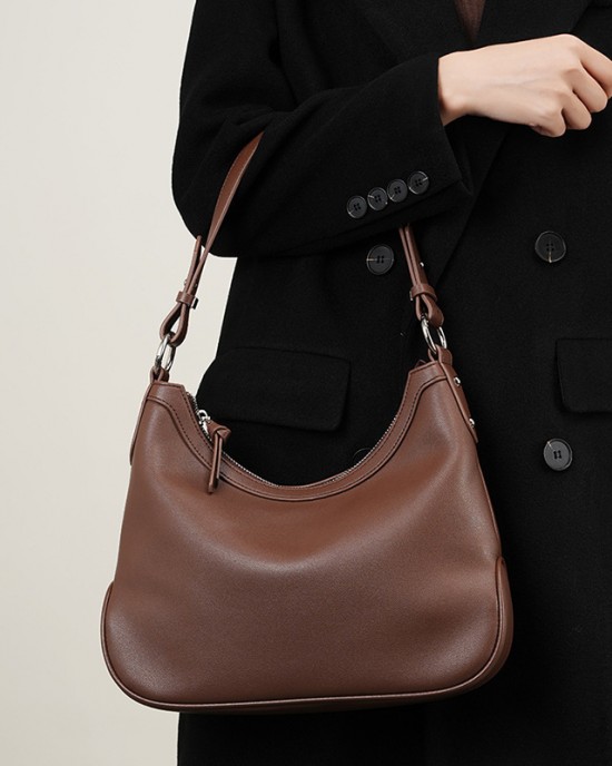 A new, premium, versatile crossbody bag for women, a new, niche Boston bowling bag for women, a stylish, underarm crossbody bag for commuters.