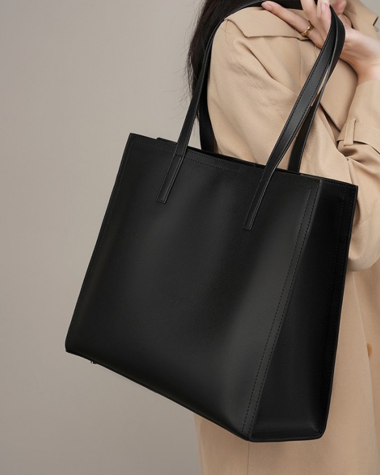 New niche women's genuine leather large-capacity briefcase, laptop bag, black cowhide commuter bag.