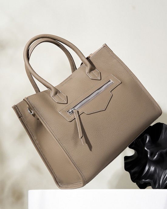 Large Large-capacity women's genuine leather tote, niche design, high-end commuter laptop briefcase.