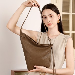 Autumn new genuine leather lazy dumpling bags, niche asymmetrical design, minimalist knotted horn bags, single-shoulder crossbody women's bags