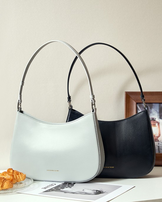 High-end genuine leather women's underarm bag, 2025 spring/summer new niche design women's bag, fashionable white shoulder bag