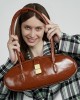 2025 new, top-grain waxed cowhide underarm bag, single-shoulder genuine leather handbag, long baguette bag for commuters.