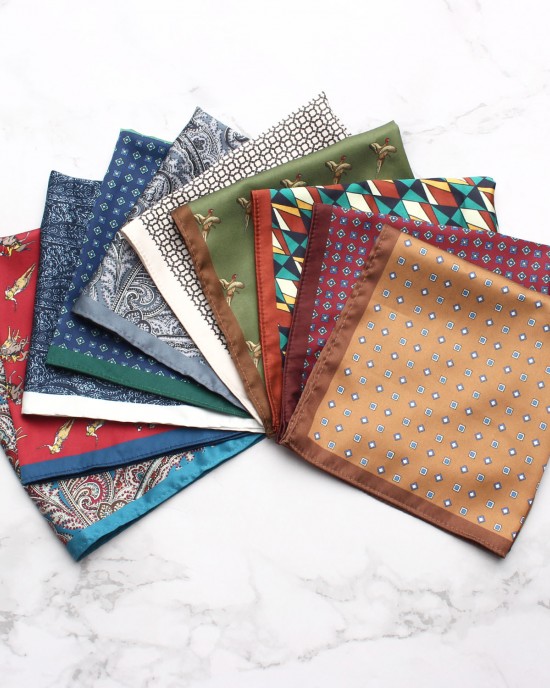 Various styles of polyester printed square handkerchiefs for casual suits and banquets. Shirt chest towels, handkerchiefs, and small squares in stock for wholesale.
