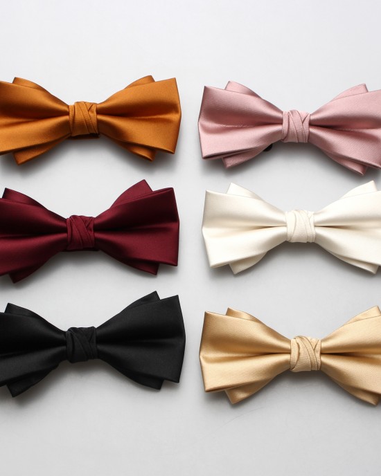 Solid-color men's polyester bow ties in stock, including multi-colored wedding groom and groomsmen bow ties and tie ties.