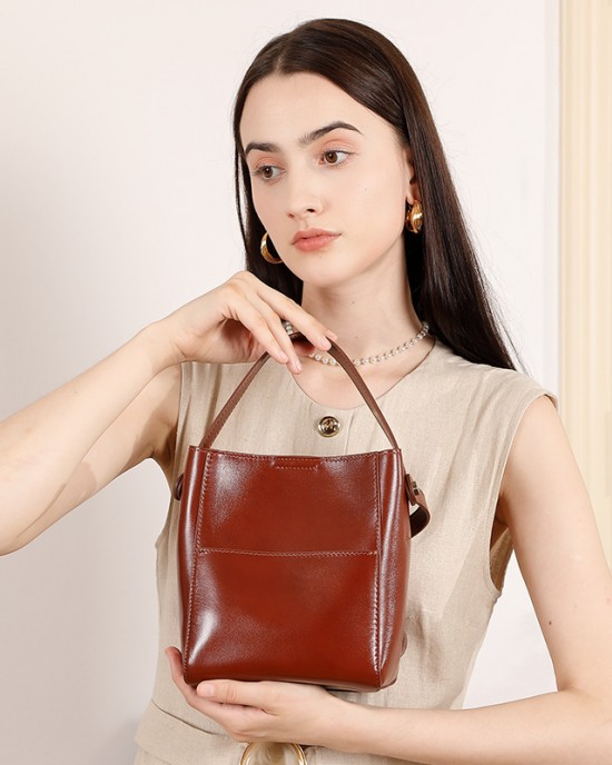 2025 new retro vegetable-tanned cowhide small bucket bag, niche genuine leather single-shoulder crossbody handbags
