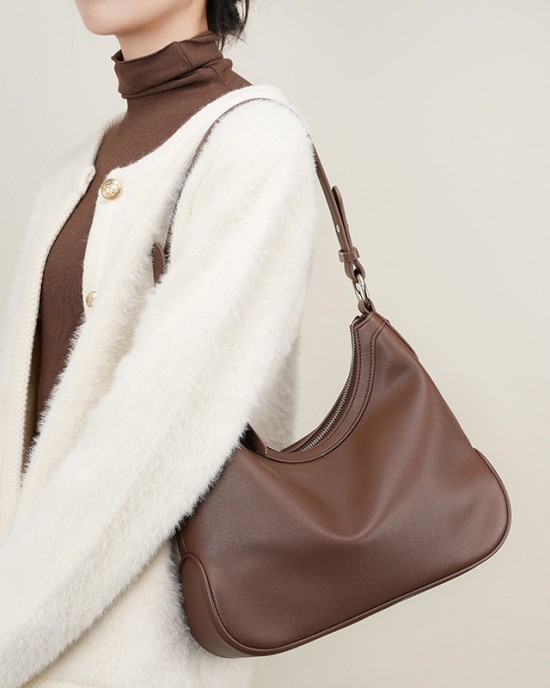 A new, premium, versatile crossbody bag for women, a new, niche Boston bowling bag for women, a stylish, underarm crossbody bag for commuters.