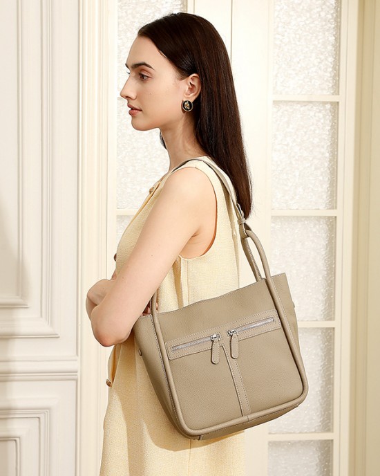 2025 top-grain cowhide niche luxury bags, new trendy horseshoe bags, large-capacity commuter shoulder bags, bucket bags.