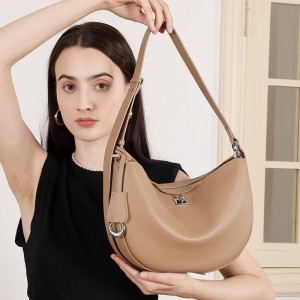 Spring fashionable cowhide bag for women, luxury underarm commuter bag, 2025 new style everyday shoulder crossbody baguette bag for women