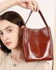 2025 new retro vegetable-tanned cowhide small bucket bag, niche genuine leather single-shoulder crossbody handbags