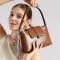 2025 autumn new style genuine leather women's handbag, niche design, stylish, simple, elegant, versatile shoulder and underarm handbag.