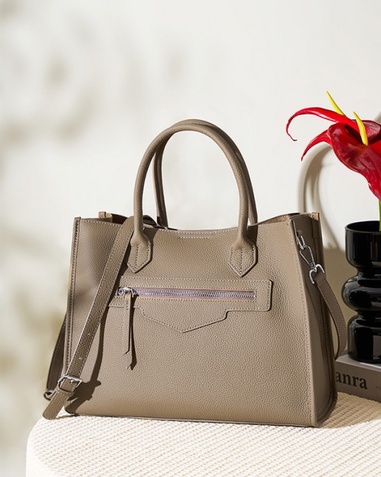 Large Large-capacity women's genuine leather tote, niche design, high-end commuter laptop briefcase.