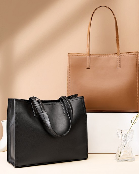 New niche women's genuine leather large-capacity briefcase, laptop bag, black cowhide commuter bag.