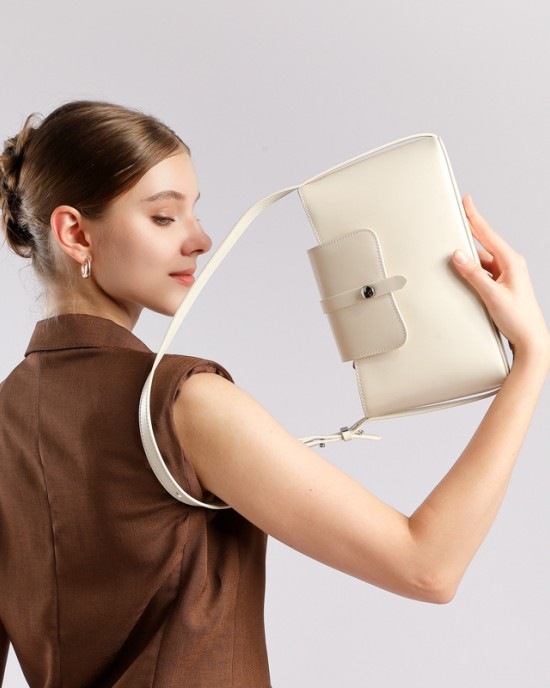 2025 autumn new style genuine leather women's handbag, niche design, stylish, simple, elegant, versatile shoulder and underarm handbag.